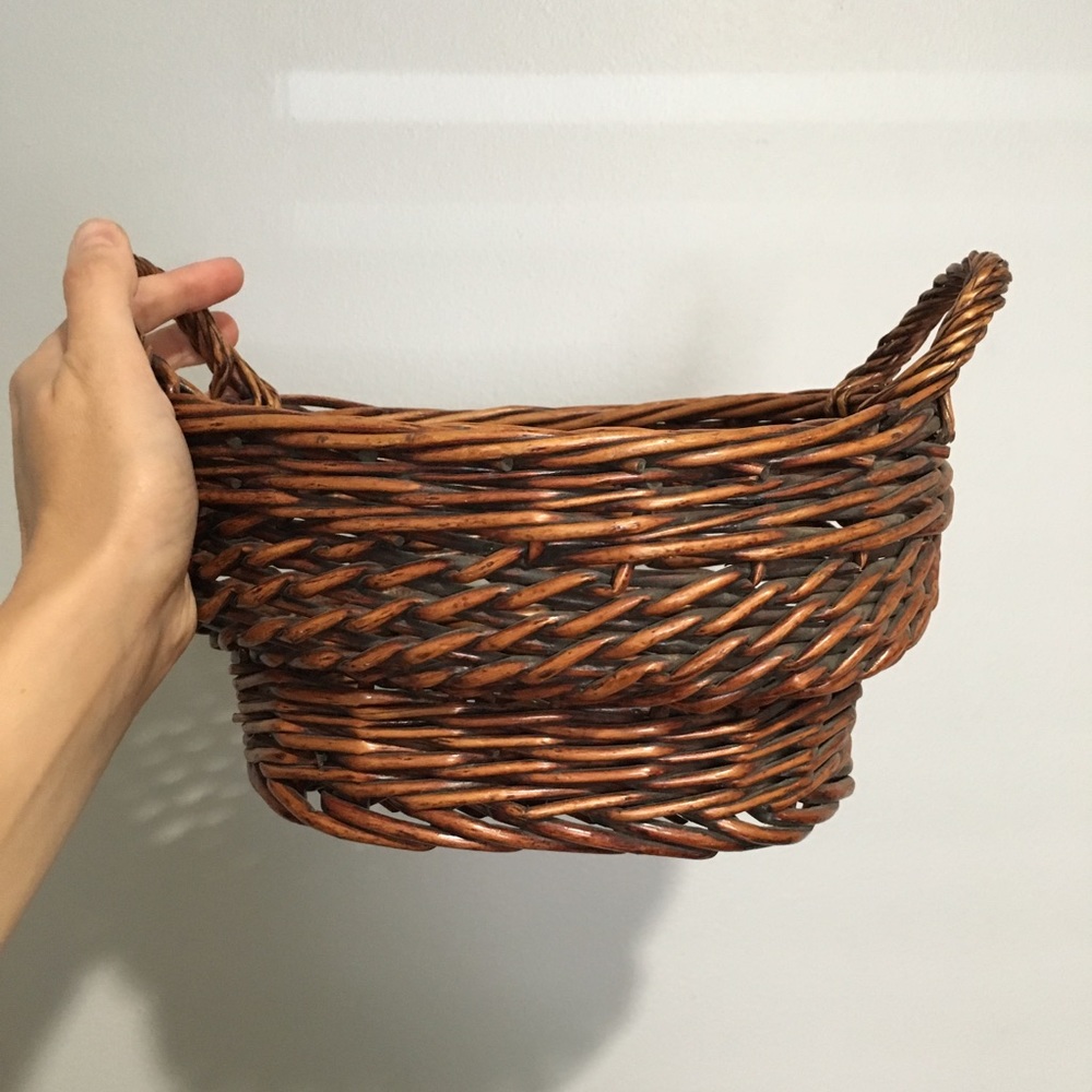 Woven dark wicker basket with handles EUC